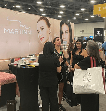 Elore team at a beauty industry tradeshow booth